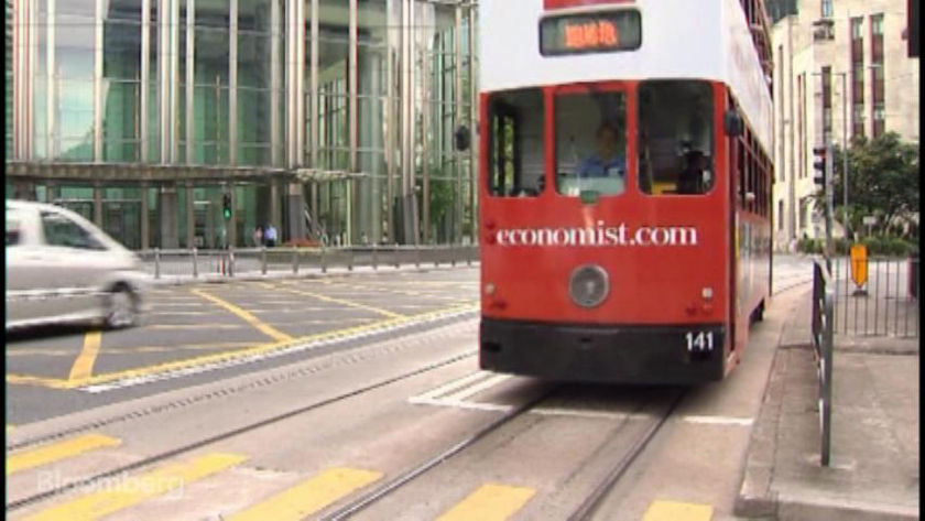 One of Hong Kong's iconic trams travels through the city, marking 110 years in service this year. u00e2u20acu201d Bloomberg pic