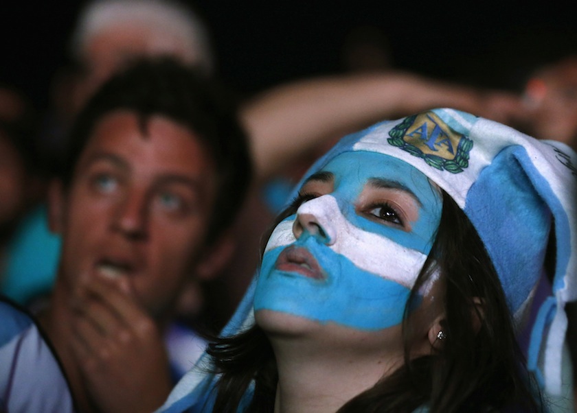 Fans of Argentina react after Germany scored a goal, during a public viewing of the 2014 Brazil World Cup final match, in Rio de Janeiro July 14, 2014.u00c2u00a0u00e2u20acu201d Reuters pic