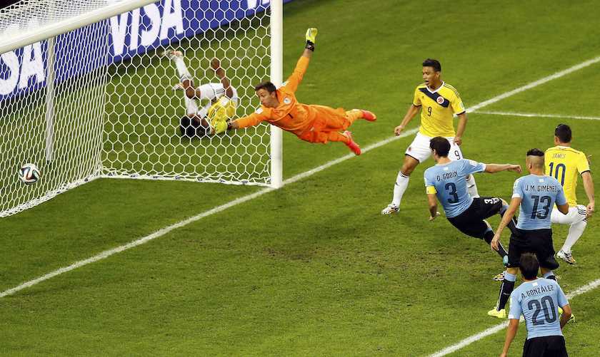 Uruguayu00e2u20acu2122s goalkeeper Fernando Muslera fails to save a goal scored by Colombiau00e2u20acu2122s James Rodriguez (right), his second goal, during their 2014 World Cup round of 16 game in Rio de Janeiro June 28, 2014. u00e2u20acu201d Reuters pic