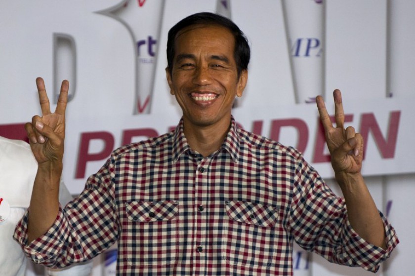 Indonesian presidential candidate Joko Widodo arriving at the final live nationwide television debate with opponent Prabowo Subianto from Jakarta on July 5, 2014 as the campaign period officially ends. u00e2u20acu201d AFP pic