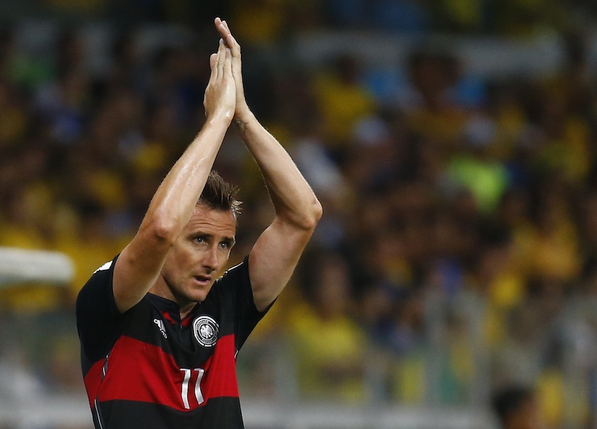Germany's Miroslav Klose claps his hands as he walks off the field after being substituted with teammate Andre Schuerrle (not pictured) during their 2014 World Cup semi-finals against Brazil at the Mineirao stadium in Belo Horizonte July 9, 2014. u00e2u20acu201du00c2u00a0Reu