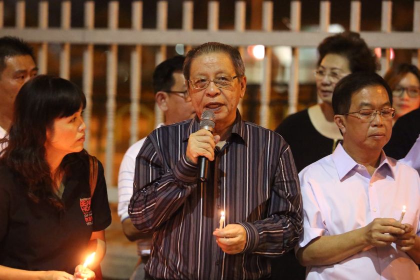 Lim Kit Siang (centre) giving a speech at the candlelight vigil held in solidarity with the MH17 victims. u00e2u20acu2022 Picture by Choo Choy May