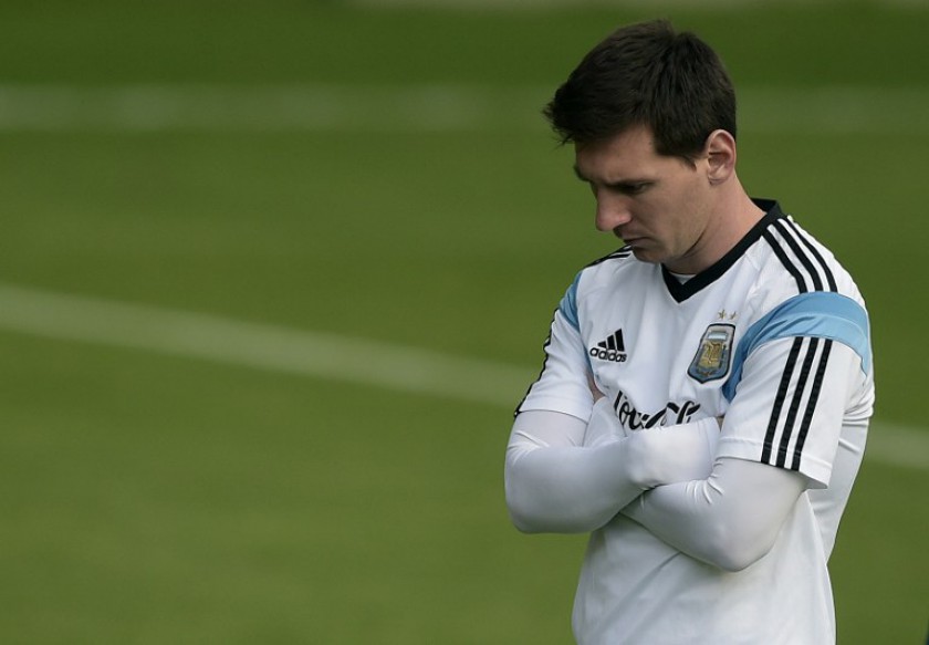 Argentinau00e2u20acu2122s forward Lionel Messi looks on during a training session at u00e2u20acu02dcCidade do Galou00e2u20acu2122, their base camp in Vespasiano, near Belo Horizonte, Brazil on July 10, 2014. u00e2u20acu201d AFP pic