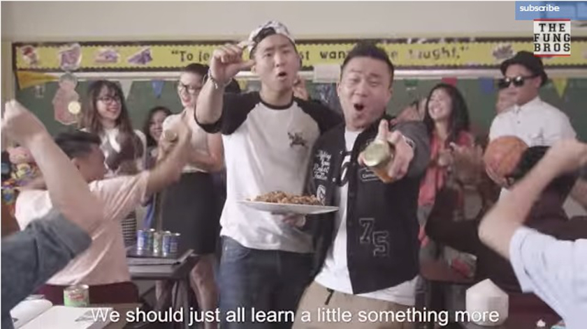 A screenshot of brothers Andrew and David Fung singing in their Fung Bros music video 'Singapore & Malaysia'.