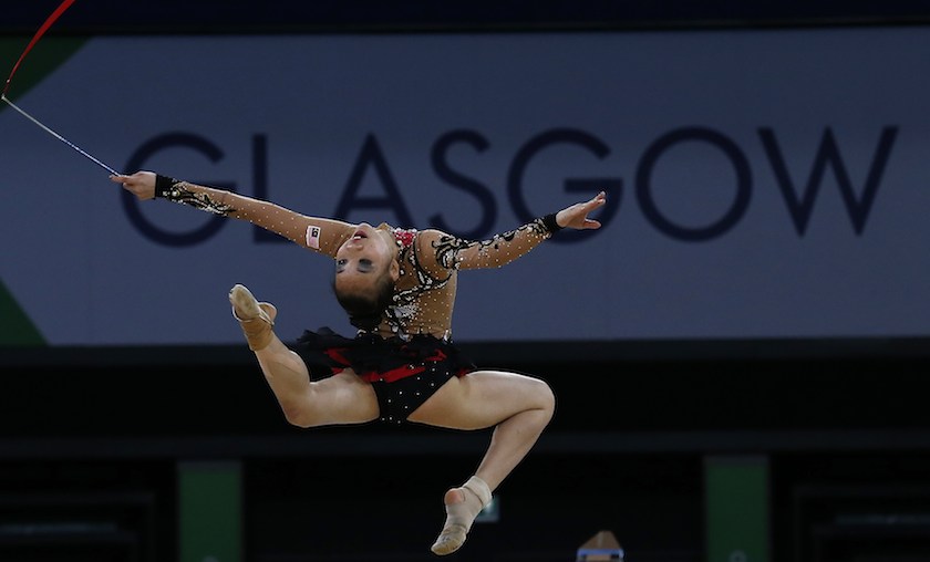 Malaysiau00e2u20acu02dcs Wong Poh San performs with the ribbon during womenu00e2u20acu2122s rhythmic gymnastics team competition at the Commonwealth Games in Glasgow, Scotland, July 24, 2014. u00e2u20acu201d Reuters pic