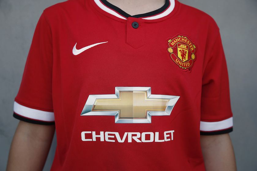A girl wears the new Manchester United jersey with a Chevrolet logo before Manchester Unitedu00e2u20acu2122s international friendly match against Los Angeles Galaxy in Pasadena, California July 23, 2014. u00e2u20acu201d Reuters pic