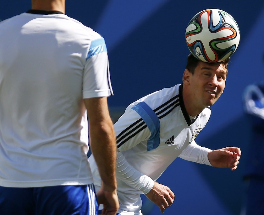 Argentina's national player Lionel Messi heads the ball during a training session at the Corinthians arena in Sao Paulo July 1, 2014, one day before their 2014 World Cup Round of 16 match against Switzerland.u00c2u00a0u00e2u20acu201du00c2u00a0Reuters pic