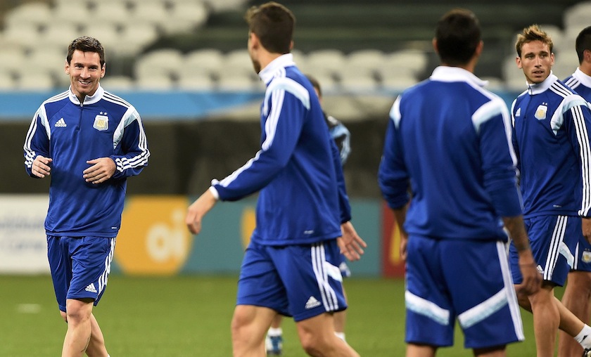 Argentina's Lionel Messi smiles during a team training session at the arena di Corinthians stadium in Sao Paulo, July 9, 2014, a day before their 2014 World Cup semi-final match against the Netherlands. u00e2u20acu201d Reuters pic