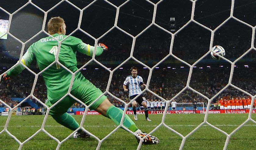 Argentina's Lionel Messi shoots to score his penalty past Jasper Cillessen of the Netherlands during their shootout in their 2014 World Cup semi-finals at the Corinthians arena in Sao Paulo July 10, 2014. u00e2u20acu201d Reuters pic