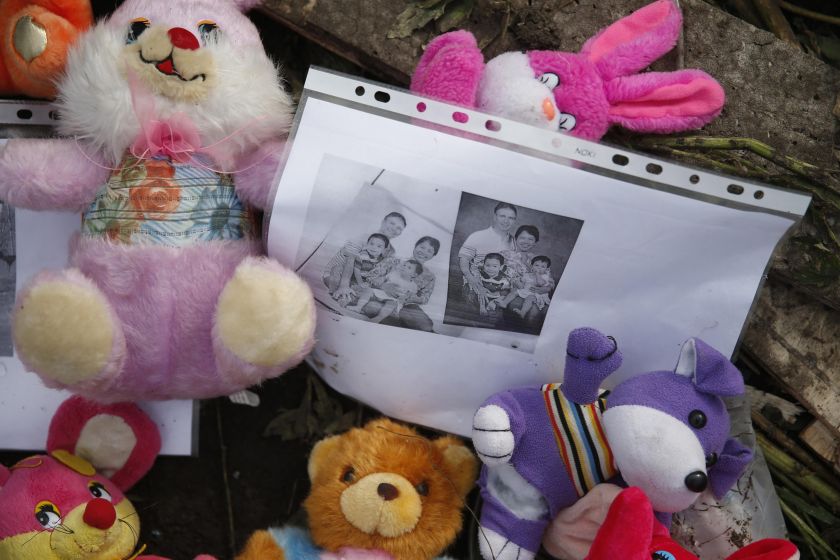 Mementos placed by local residents at the crash site of Malaysia Airlines Flight MH17 are pictured near the settlement of Rozspyne in the Donetsk region July 19, 2014. — Reuters pic