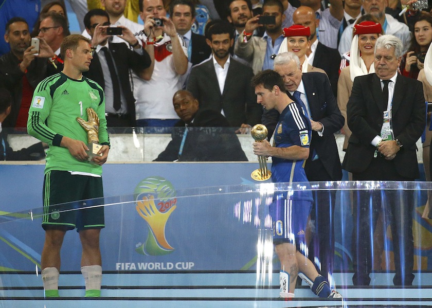 Argentina's Lionel Messi holds the Golden Ball trophy as Germany's goalkeeper Manuel Neuer holds the Golden Glove trophy after their 2014 World Cup final at the Maracana stadium in Rio de Janeiro July 14, 2014.u00c2u00a0u00e2u20acu201d Reuters pic
