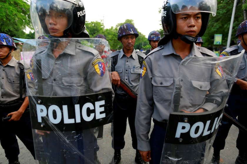 Policemen stand guard in a Muslim neighbourhood in Mandalay July 4, 2014. u00e2u20acu201d Reuters pic