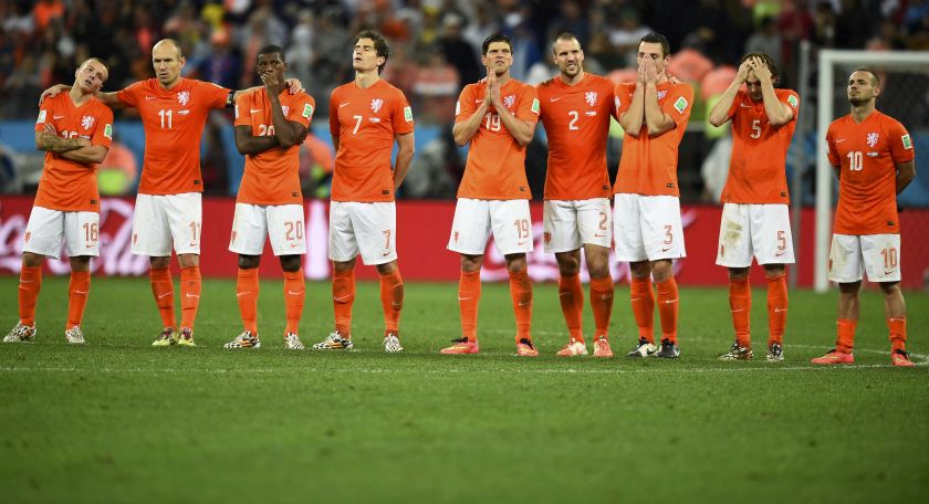 Wesley Sneijder of the Netherlands (right) and his teammates react after the final penalty was taken during their penalty shootout against Argentina in their 2014 World Cup semi-finals July 10, 2014. u00e2u20acu201d Reuters pic