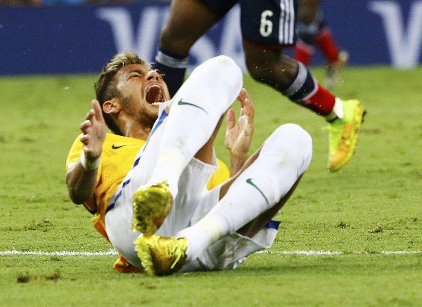 Brazil's Neymar grimaces after being fouled during the 2014 World Cup quarter-finals against Colombia at the Castelao arena in Fortaleza. u00e2u20acu201d Reuters pic