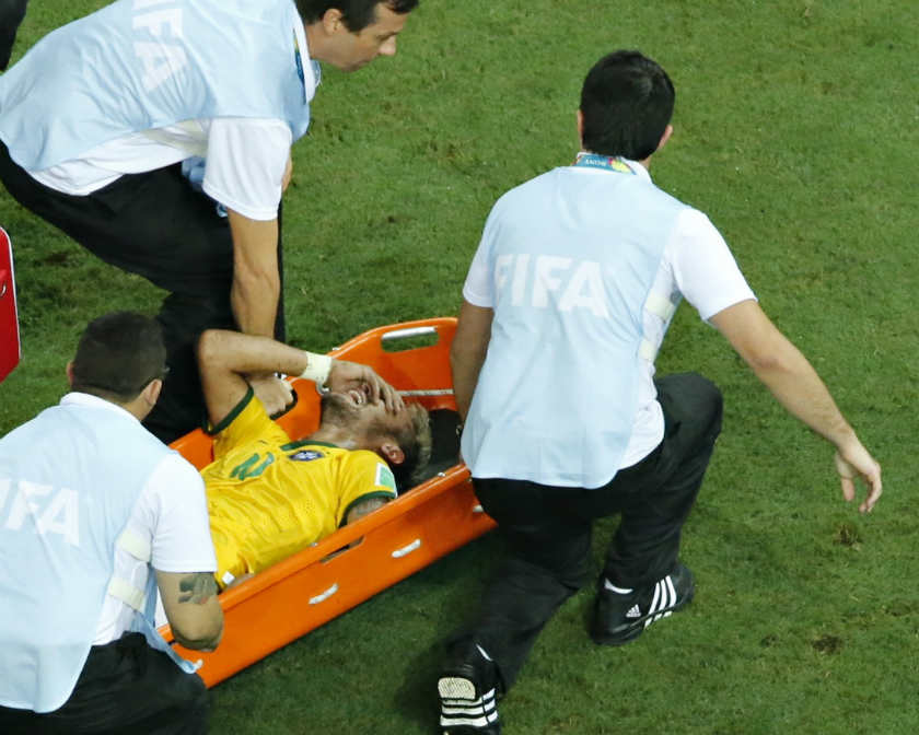 Brazil's Neymar grimaces in pain as he is carried off pitch on a stretcher during their 2014 World Cup quarter-finals against Colombia at the Castelao arena in Fortaleza July 4, 2014. u00e2u20acu201d Reuters pic