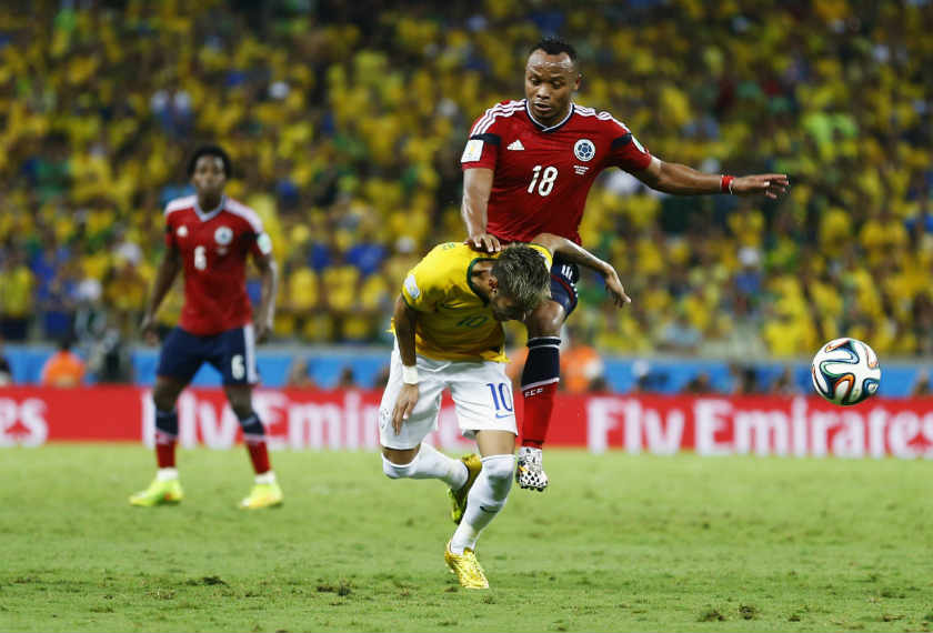 Brazil's Neymar (bottom) is fouled by Colombia's Camilo Zuniga during their 2014 World Cup quarter-finals at the Castelao arena in Fortaleza July 4, 2014. u00e2u20acu201d Reuters pic
