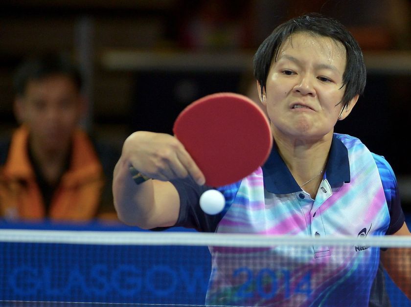 National table tennis player Ng Sock Khim in action against Singapore's Yu Mengyu at the Commonwealth Games in Glasgow, July 27, 2104. Bernama pic