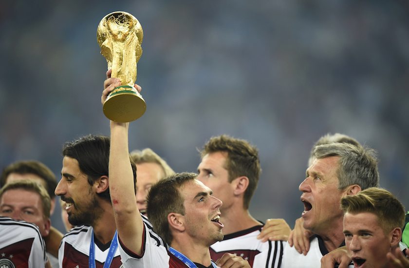 Germanyu00e2u20acu02dcs captain Philipp Lahm lifts the World Cup trophy as he celebrates with his teammates after the 2014 World Cup final between Germany and Argentina in Rio de Janeiro July 13, 2014. u00e2u20acu201d Reuters pic
