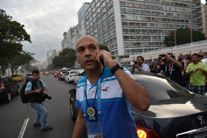 A civil police officer is seen outside the Copacaban Hotel, the official accommodation for FIFA executives during the 2014 FIFA World Cup, following the arrest of Ray Whelan over illegal cup tickets in Rio de Janeiro on July 7, 2014. u00e2u20acu201d AFP pic
