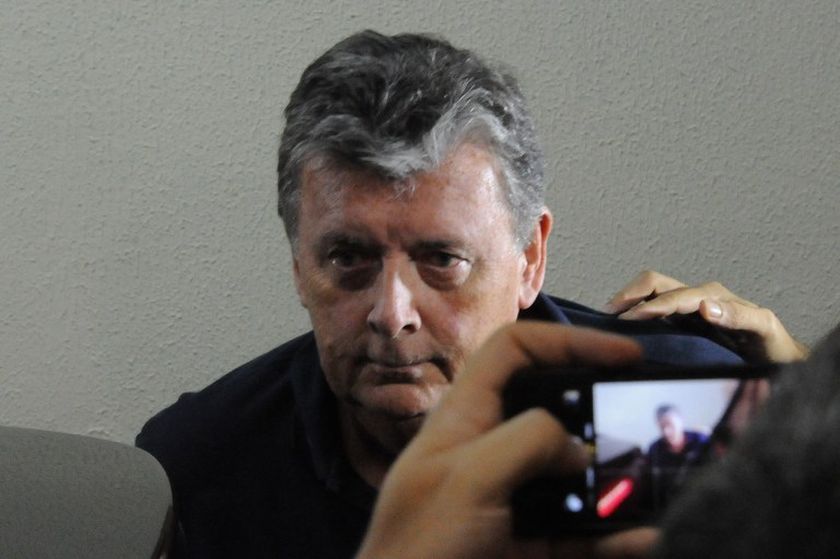 Raymond Whelan sits at a police station in Rio de Janeiro after being arrested for allegedly leading a network that illegal sold game passes, on July 7, 2014 in Rio de Janeiro. u00e2u20acu201d AFP pic 