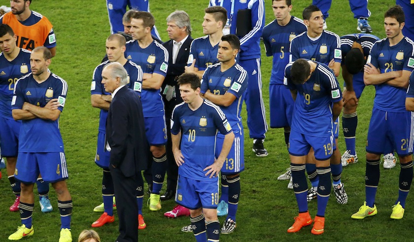 Argentina's coach Alejandro Sabella stands between his players after their loss to Germany in their 2014 World Cup final at the Maracana stadium in Rio de Janeiro July 14, 2014.u00c2u00a0u00e2u20acu201d Reuters pic