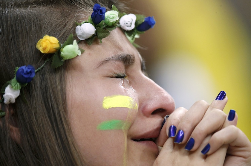 A Brazil fan reacts after the 2014 World Cup third-place playoff between Brazil and the Netherlands at the Brasilia national stadium in Brasilia July 13, 2014. u00e2u20acu201d Reuters pic