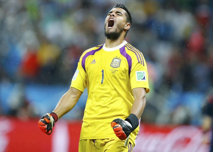 Argentina's goalkeeper Sergio Romero reacts after saving a goal attempt from Ron Vlaar of the Netherlands during a penalty shoot-out during their 2014 World Cup semi-finals at the Corinthians arena in Sao Paulo July 10, 2014. u00e2u20acu201d Reuters pic