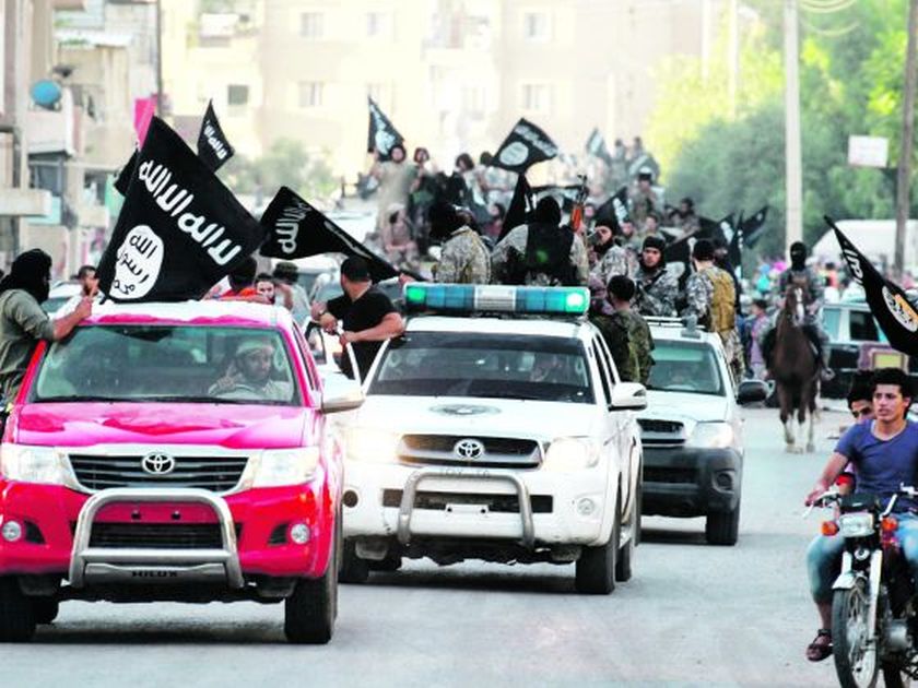 Islamist fighters taking part in a military parade in Syriau00e2u20acu2122s northern Raqqa province. The Syrian crisis has worrying parallels with the Soviet-Afghan war in the 1980s, says Singapore Deputy Prime Minister Teo Chee Hean. u00e2u20acu2022 Reuters pic