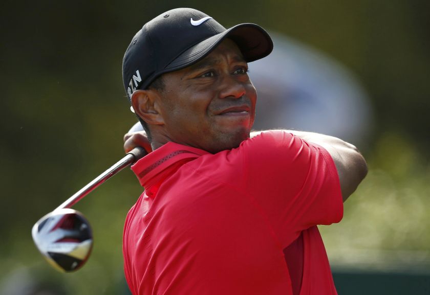 Tiger Woods of the US watches his tee shot on the fifth hole during the final round of the British Open Championship at the Royal Liverpool Golf Club in Hoylake, northern England July 20, 2014. u00e2u20acu201d Reuters pic
