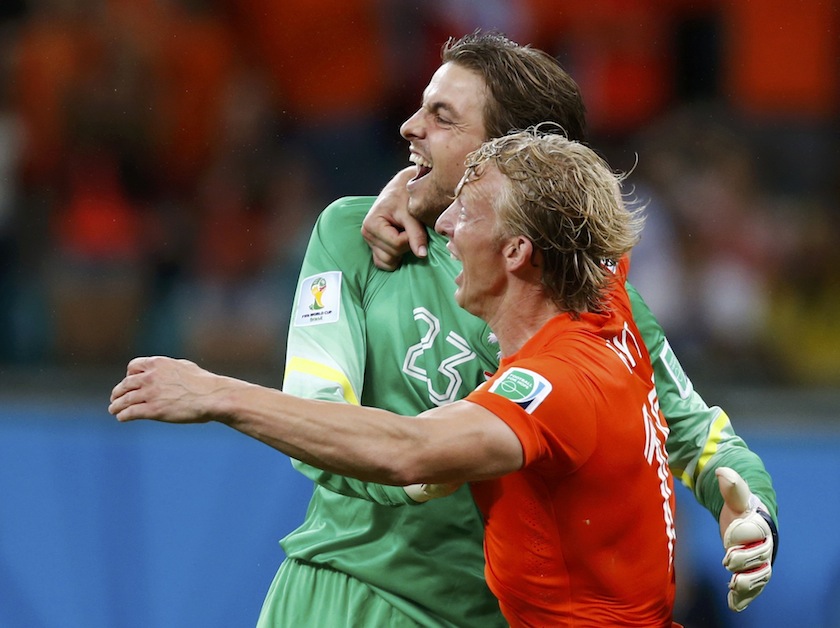 Goalkeeper Tim Krul of the Netherlands celebrates with teammate Dirk Kuyt after saving the last penalty shot against Costa Rica during a penalty shootout in their 2014 World Cup quarter-finals at the Fonte Nova arena in Salvador July 6, 2014.u00c2u00a0u00e2u20acu201d Reuters