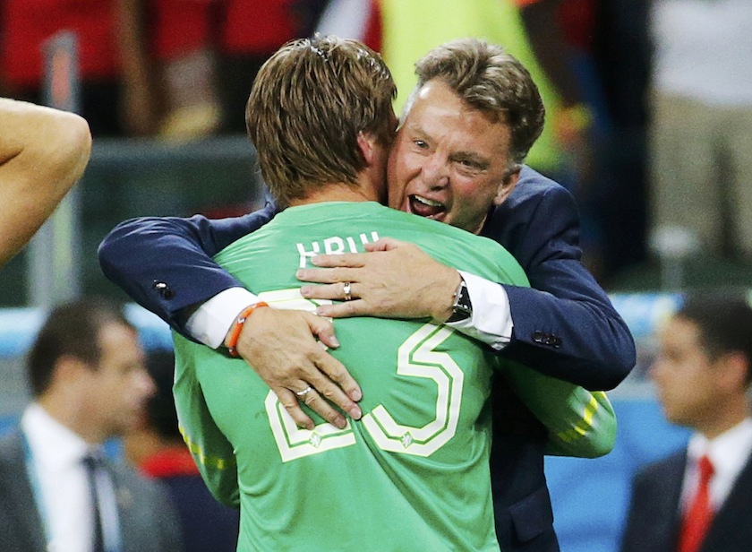 Tim Krul of the Netherlands is hugged by coach Louis van Gaal after making the match winning penalty save in their shootout against Costa Rica during their 2014 World Cup quarter-finals at the Fonte Nova arena in Salvador July 6, 2014.u00c2u00a0u00e2u20acu201d Reuters pic