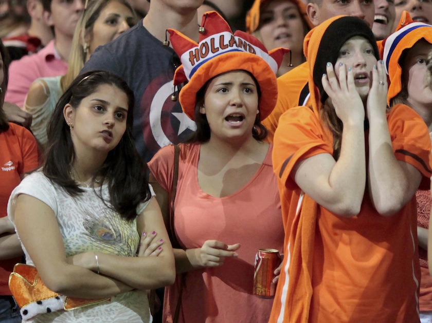 Fans react while watching a broadcast of the 2014 Brazil World Cup quarterfinal game between Costa Rica and the Netherlands in Holambra, a Dutch immigrant colony 140kms north of Sao Paulo, July 6, 2014.u00c2u00a0u00e2u20acu201d Reuters pic