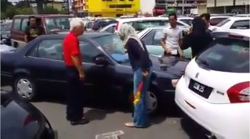 A screen grab of the video uploaded to YouTube yesterday in which a woman can be seen berating an elderly man for crashing into her car.