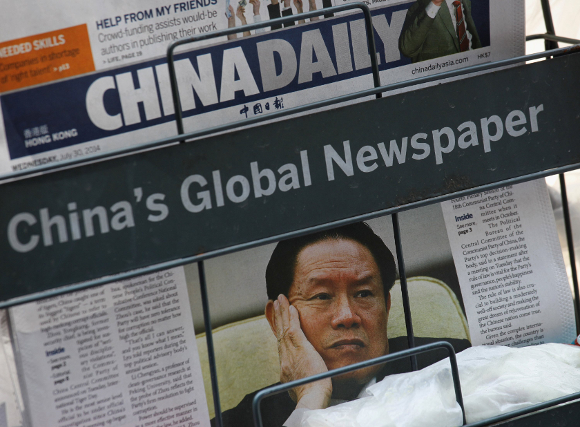 A newspaper with a picture of China's then Politburo Standing Committee Member Zhou Yongkang is seen at a newsstand in Hong Kong July 30, 2014. u00e2u20acu201d Reuters pic