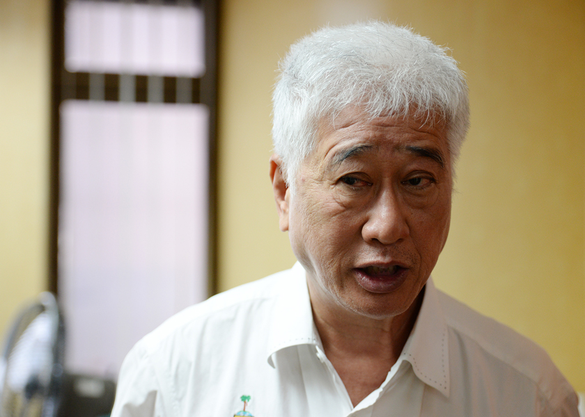 Penang voluntary patrol unit (PPS) chairman Phee Boon Poh advise the member and witness to make a police report and let the police to investigate, August 18,2014. u00e2u20acu201d Picture by KE Ooi
