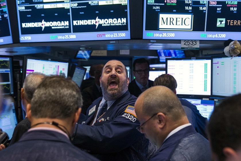 Traders work on the floor of the New York Stock Exchange shortly after the start of trading August 11, 2014. u00e2u20acu201d Reuters pic
