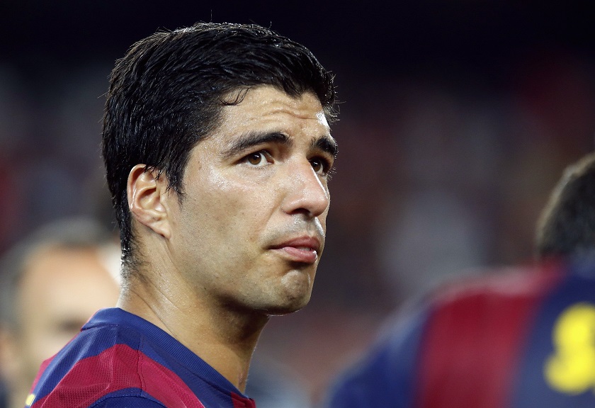 Barcelonau00e2u20acu02dcs Luis Suarez looks on after winning the Joan Gamper Trophy football match against Mexicou00e2u20acu02dcs Club Leon at Nou Camp stadium in Barcelona August 18, 2014. u00e2u20acu201d Reuters picn