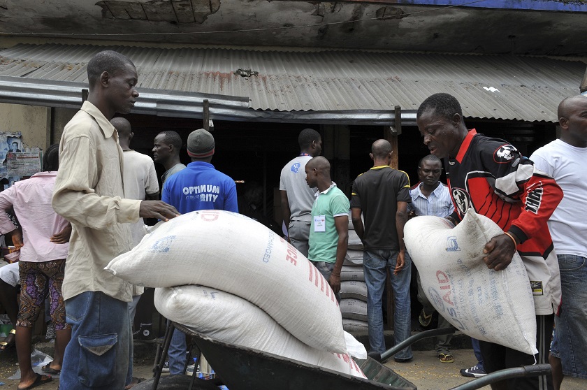 Residents of West Point neighbourhood, which has been quarantined following an outbreak of Ebola, receive food rations from the United Nations World Food Programme (WFP) in Monrovia August 28, 2014. u00e2u20acu201d Reuters pic