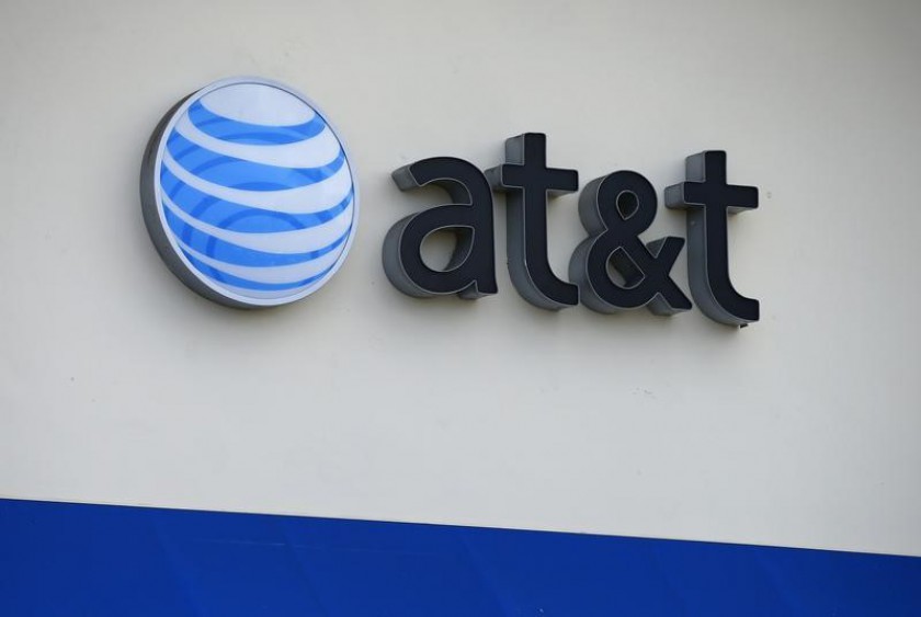 The AT&T logo is pictured by its store in Carlsbad, California. AT&T Inc announced Aug 27, 2014 that it would be merging its wireless and business divisions into a single unit. u00e2u20acu201d Reuters pic