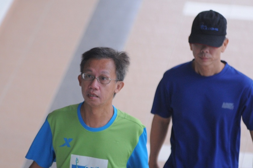 Albert Yam Kam Hoong (left) and a suspect of the u00e2u20acu02dcPenang Nude Sports Gameu00e2u20acu2122 arrive at the Balik Pulau Magistrateu00e2u20acu2122s Court to face the charges, August 28, 2014. u00e2u20acu201d Picture by K.E. Ooi 
