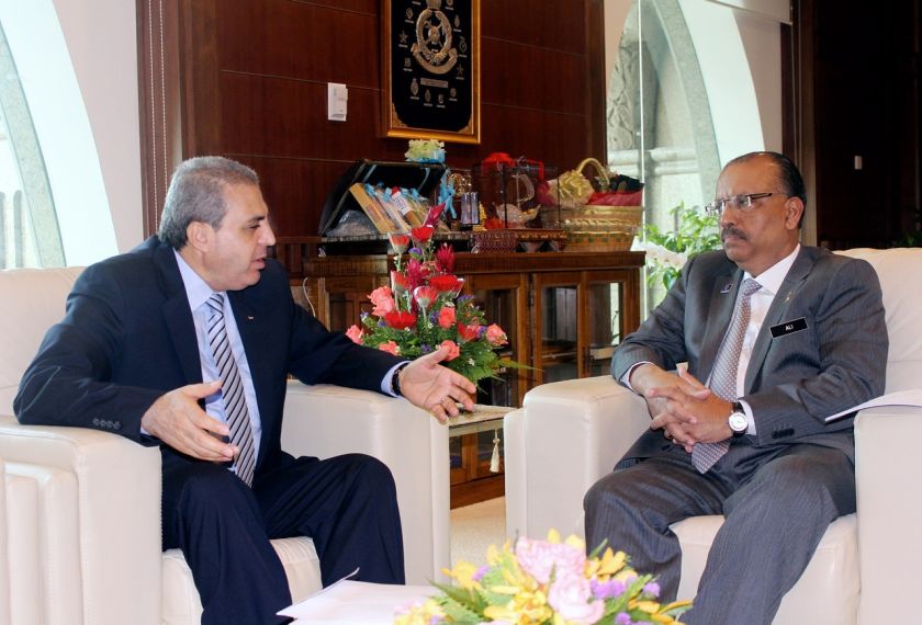 Malaysiau00e2u20acu2122s Chief Secretary Tan Sri Dr Ali Hamsa (right) at a discussion with the Palestine ambassador to Malaysia Dr Anwar Al-Agha at Dr Aliu00e2u20acu2122s office in Putrajaya, July 26, 2014. u00e2u20acu201d Bernama pic