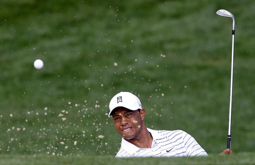Tiger Woods hits from a sand trap on the 12th hole during the second round of the PGA Championship at Valhalla Golf Club in Louisville, Kentucky, August 9, 2014. u00e2u20acu201d Reuters pic  