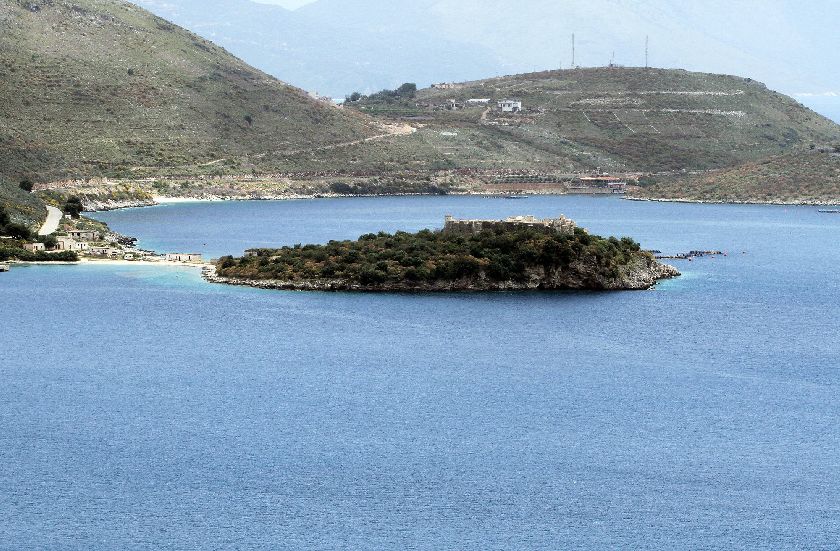 The bay that takes its appeal from its seclusion, where German, Czech and Hungarian tourists lose no time in stripping off and bathing naked. — Reuters/Arben Celi pic