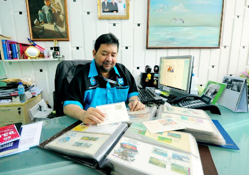 Philatelist Ahmad Zukiman Zain, deputy editor-in-chief (foreign news service) Bernama in his office in Wisma Bernama Bernama pic