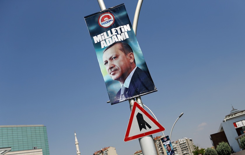 A presidential election campaign banner of Turkey's Prime Minister Tayyip Erdogan, with a slogan that reads 'Man of the nation', hangs on a street near his ruling AK Party headquarters in Ankara August 11, 2014. u00e2u20acu201d Reuters pic