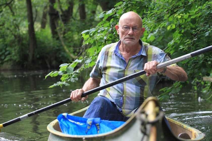 German survival expert and veteran adventurer Ruediger Nehberg paddles in a canoe in Rausdorf near Hamburg, northern Germany, June 26, 2014. u00e2u20acu201d AFP pic