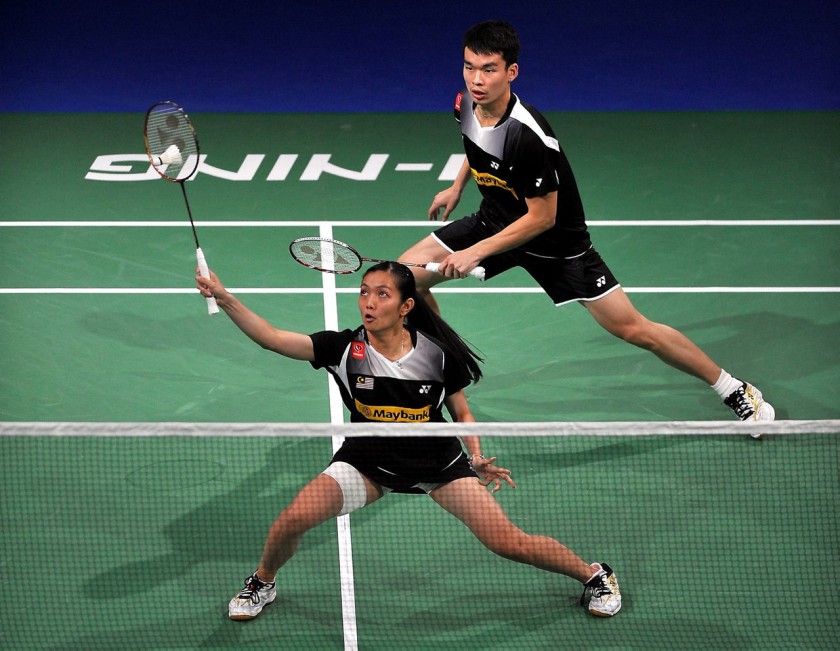 Tan Aik Quan and Lai Pei Jing return the shuttlecock to their opponents from England, Chris Adcock and Gabrielle Adcock at the World Championship in Copenhagen, Denmark, August 26, 2014. u00e2u20acu201d Bernama pic