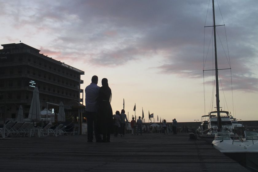 A couple stands on the pier at Saint-George Yacht Club & Marina in Beirut August 19, 2014. u00e2u20acu2022 Reuters pic