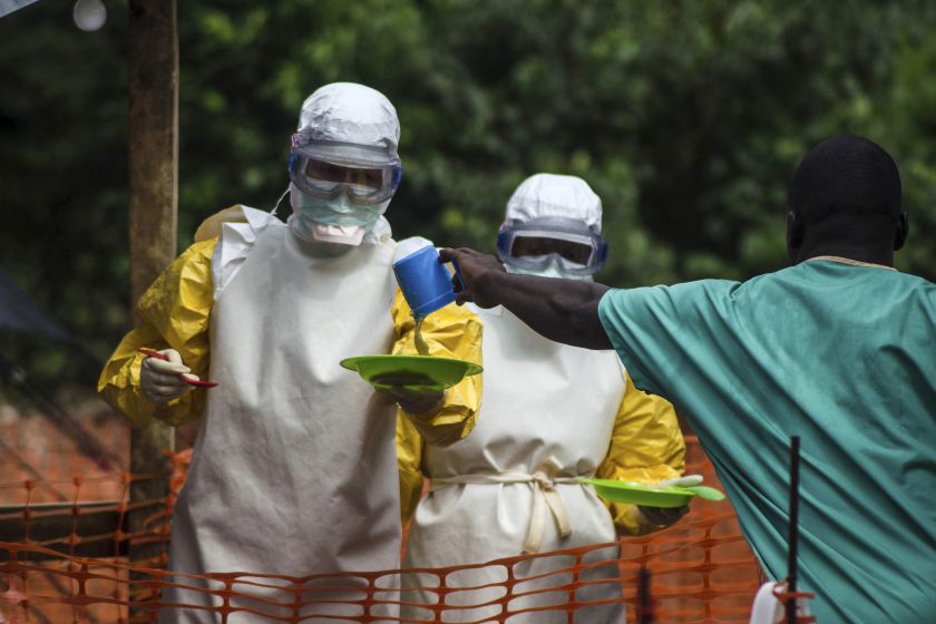 Medical staff working with Medecins sans Frontieres (MSF) prepare to bring food to patients kept in an isolation area at the MSF Ebola treatment centre in Kailahun, Sierra Leone, July 20, 2014. u00e2u20acu201d Reuters pic