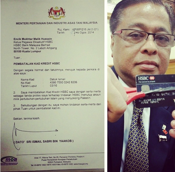 A photo shared on the minister's Instagram account showing him cutting his credit card along with the cancellation letter to HSBC. — Instagram screengrab